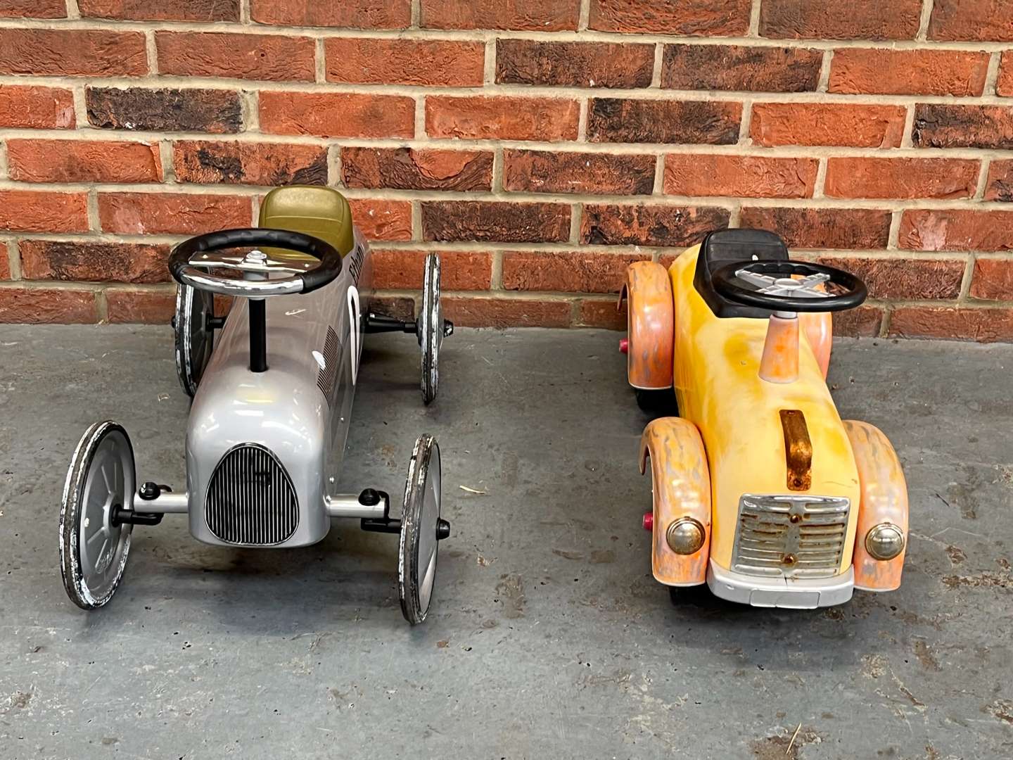 <p>Two Vintage Styled Childrens Cars</p>