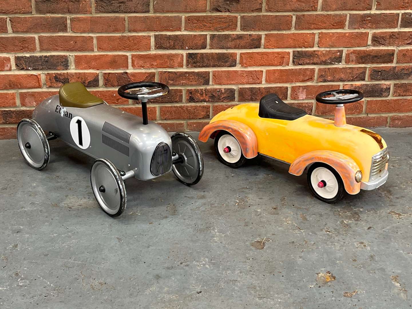 <p>Two Vintage Styled Childrens Cars</p>