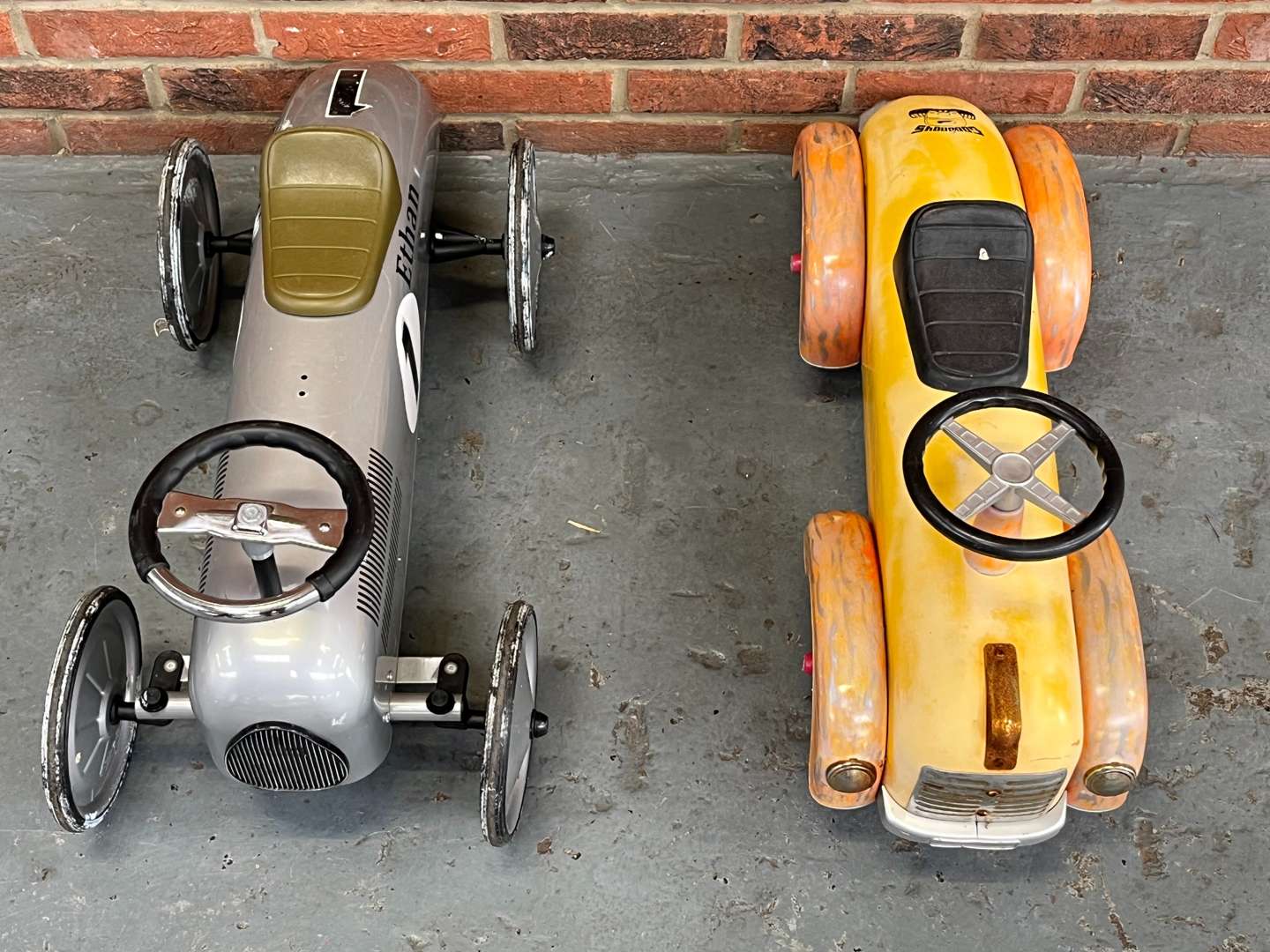 <p>Two Vintage Styled Childrens Cars</p>