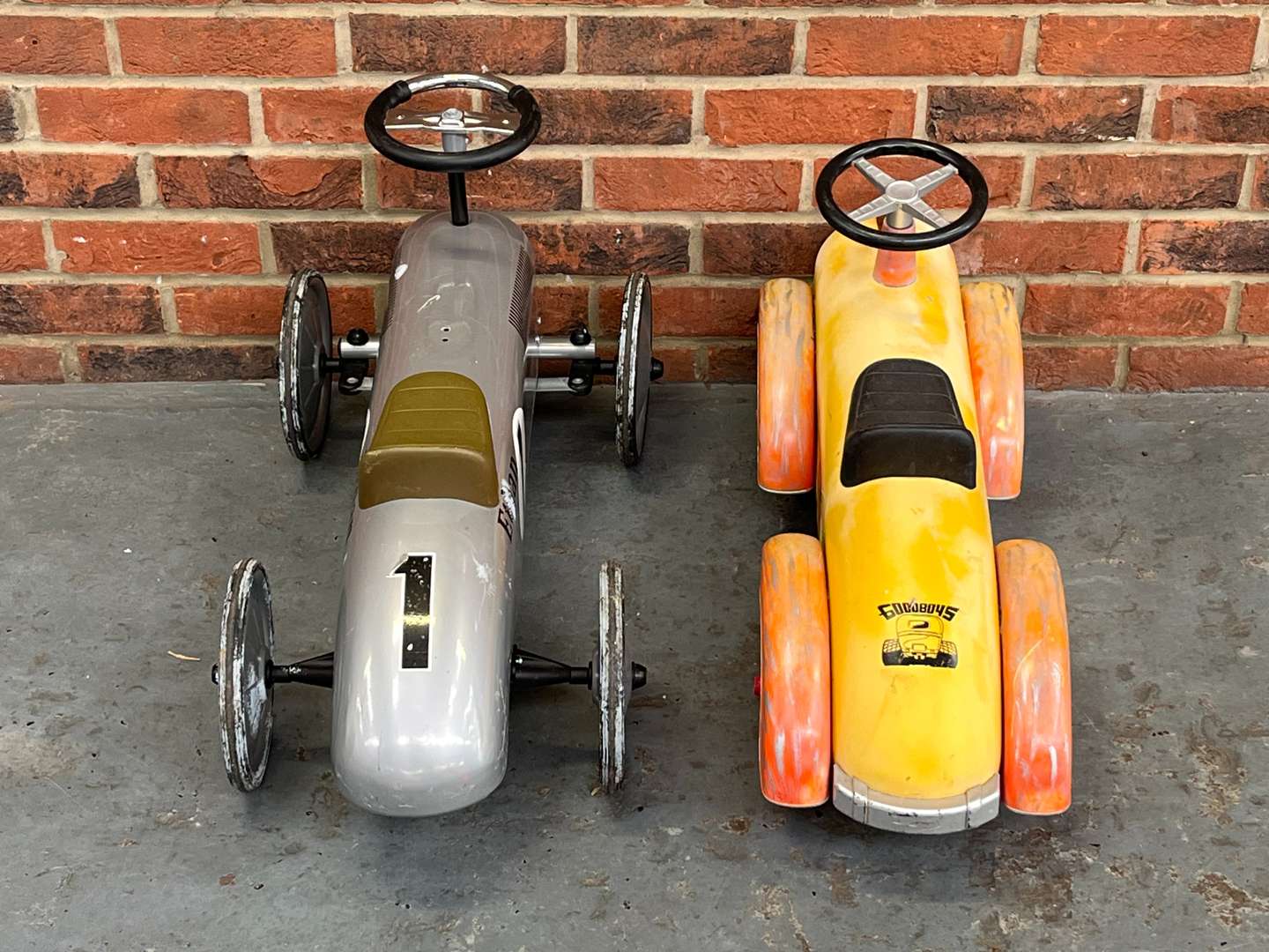 <p>Two Vintage Styled Childrens Cars</p>