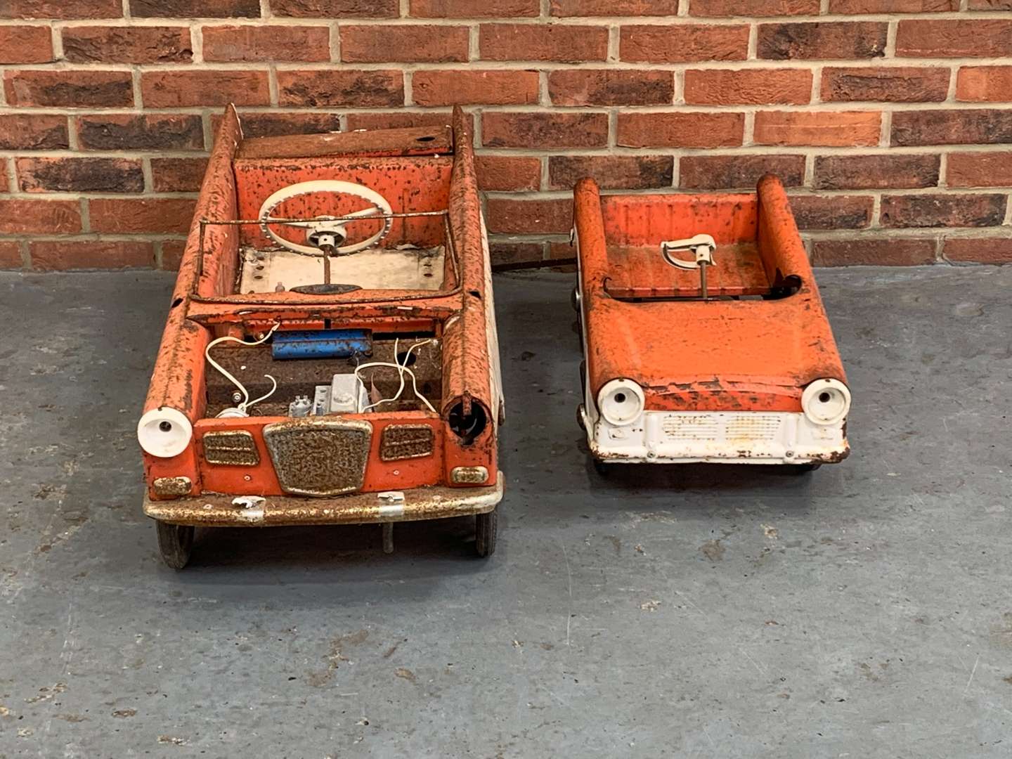 <p>Two Tin Plate Children's Pedal Cars</p>