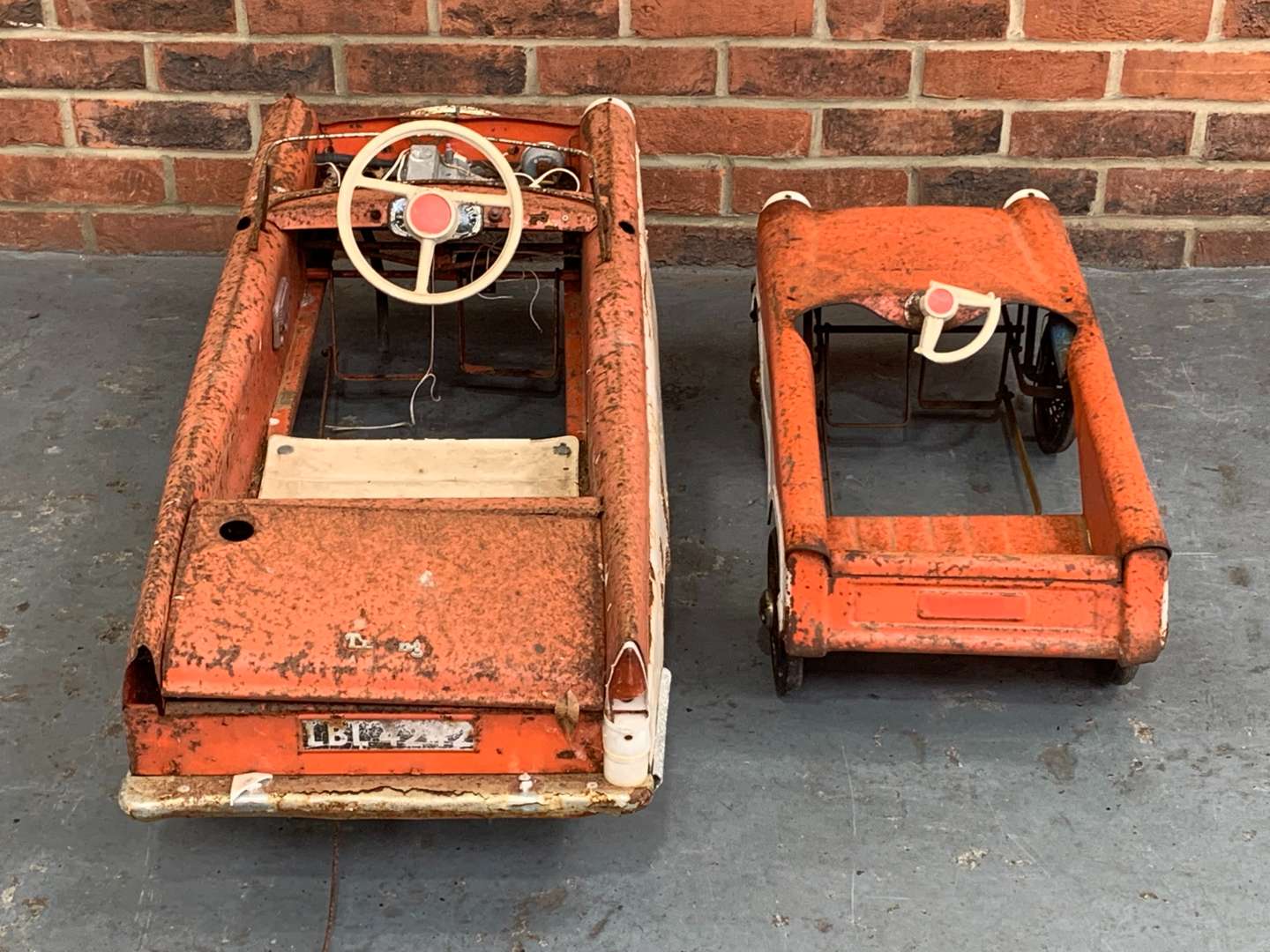 <p>Two Tin Plate Children's Pedal Cars</p>