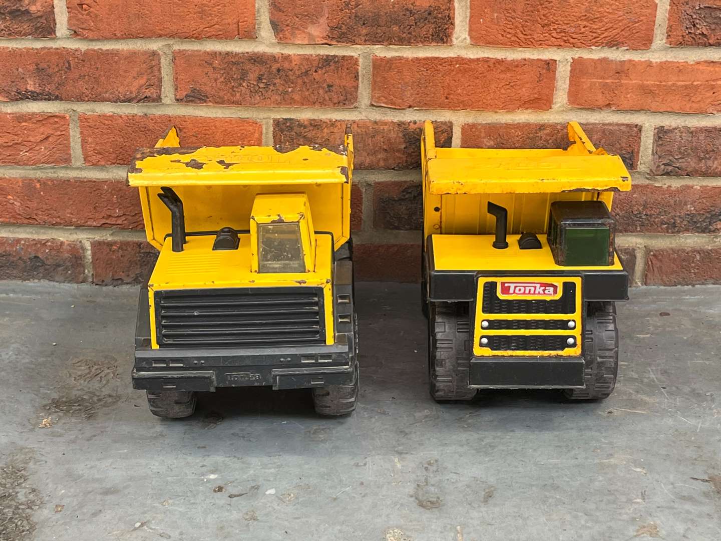 <p>Two Tonka Tin Plate Toy Trucks</p>