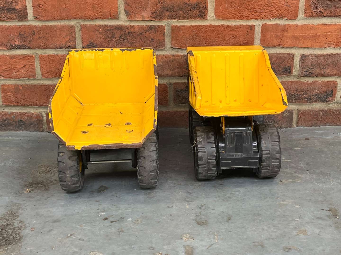 <p>Two Tonka Tin Plate Toy Trucks</p>