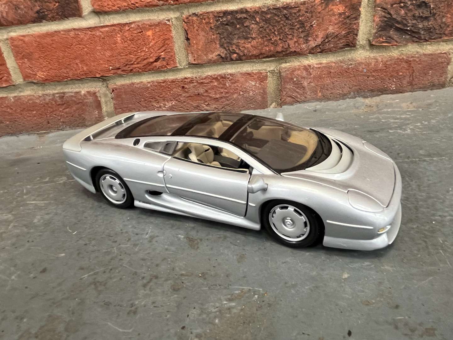 <p>Two Jaguar XJ220 Model Cars By Maisto</p>