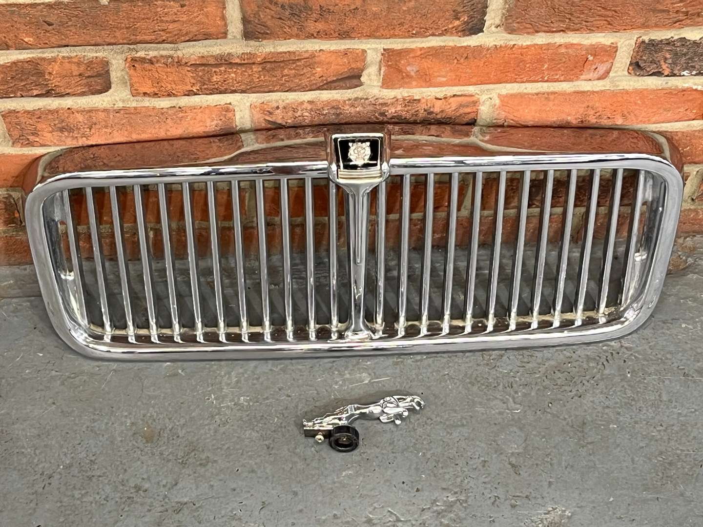 <p>Jaguar XKS Grille and Mascot Together With a Wolseley Grille (3)</p>