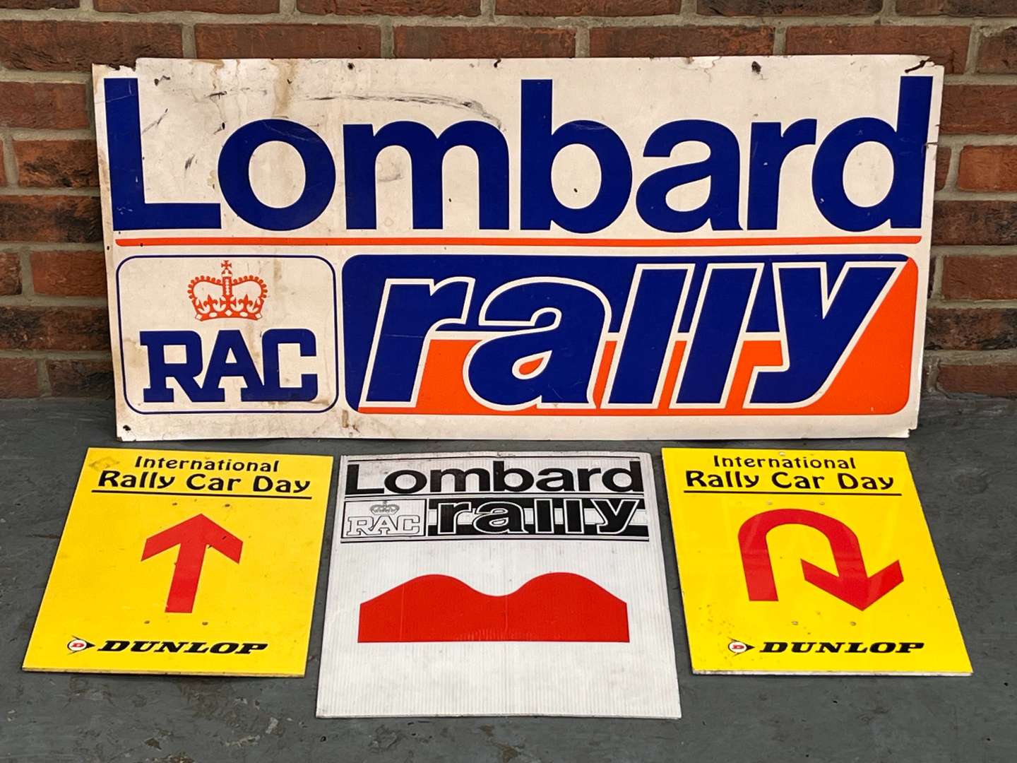 <p>Two Lombard Rally Signs and Two Dunlop Signs (4)</p>