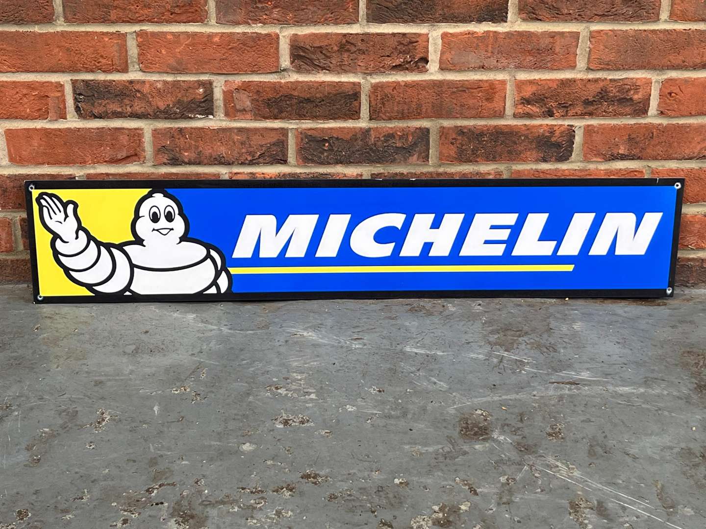 <p>Michelin Metal Waving Man Sign</p>