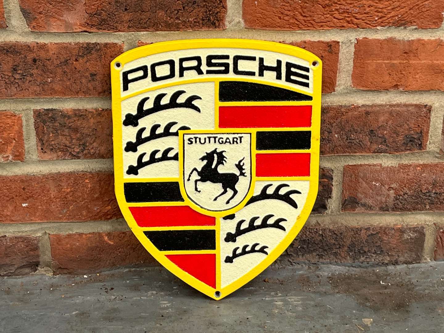 <p>Porsche Cast Iron Emblem Sign</p>