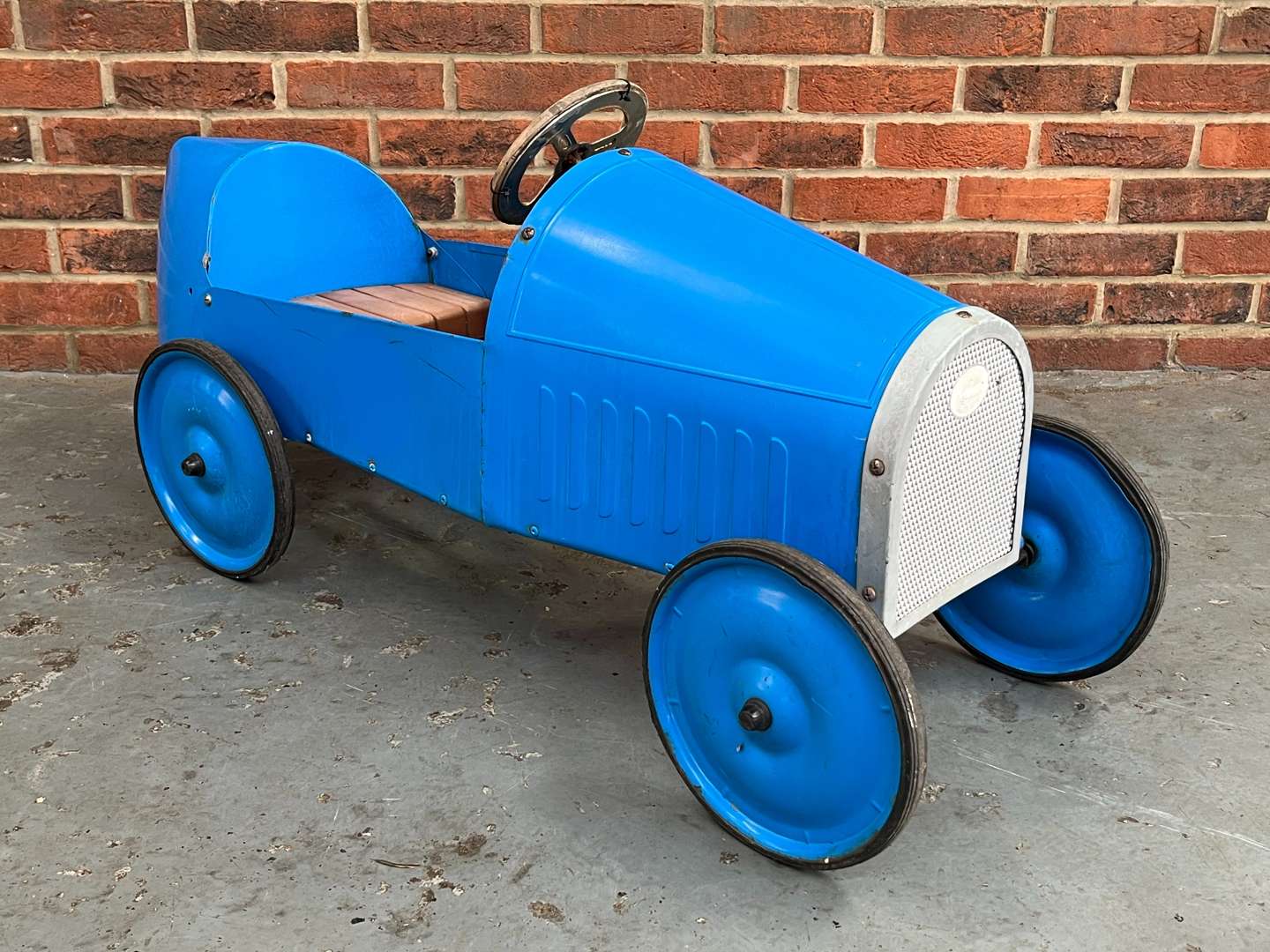 <p>Tin Plate Childs Pedal Car</p>