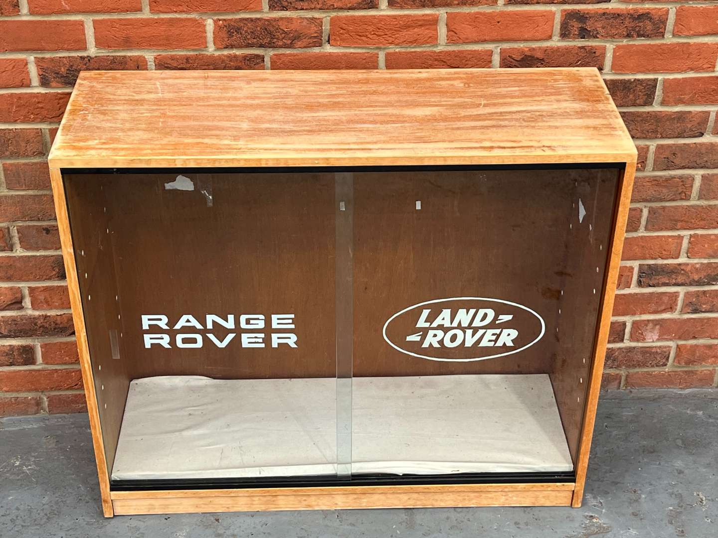 <p>Land Rover Painted Glass Fronted Display Cabinet</p>