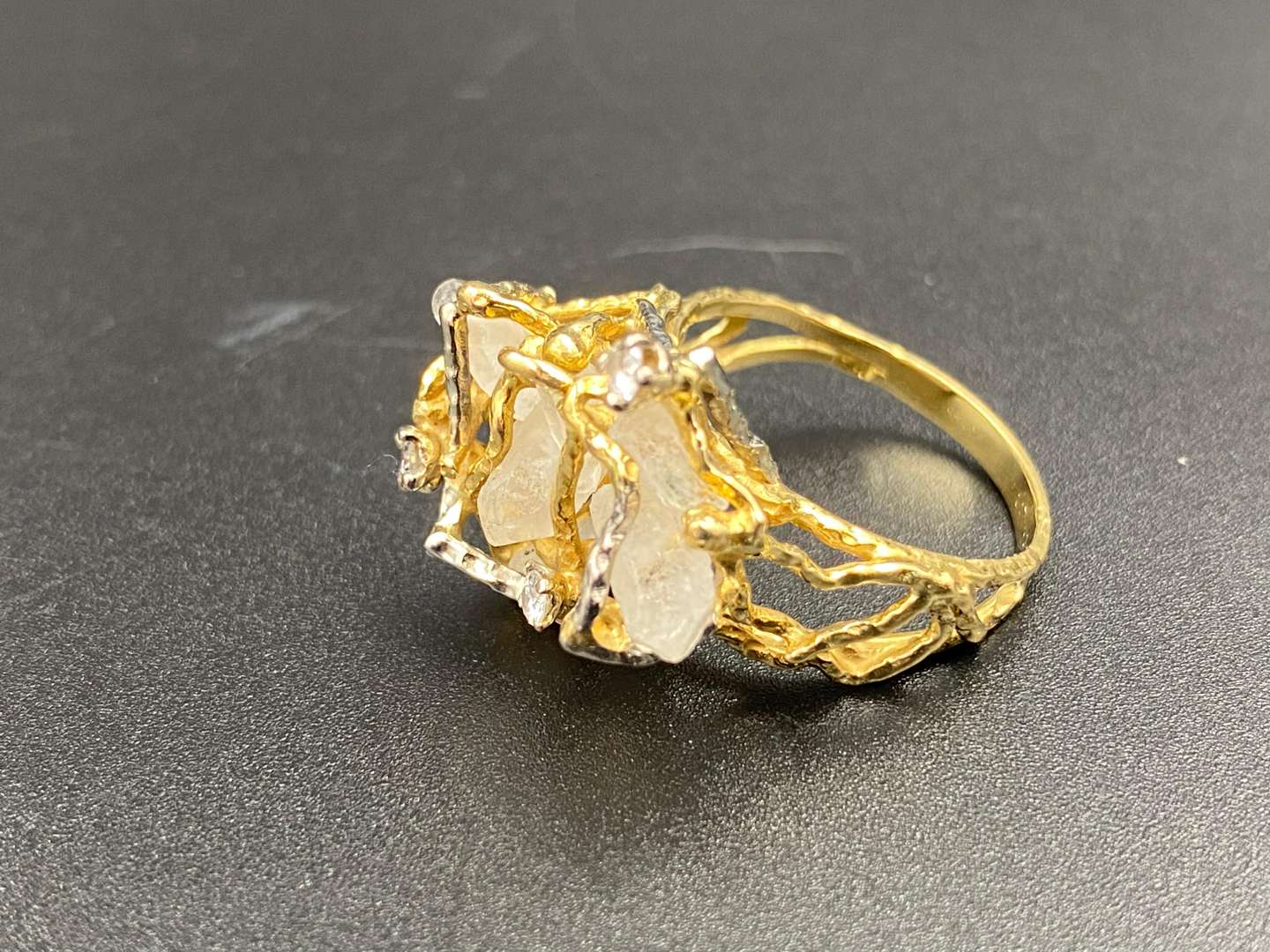 <p>A large quartz and diamond set, 18ct gold dress ring.</p>