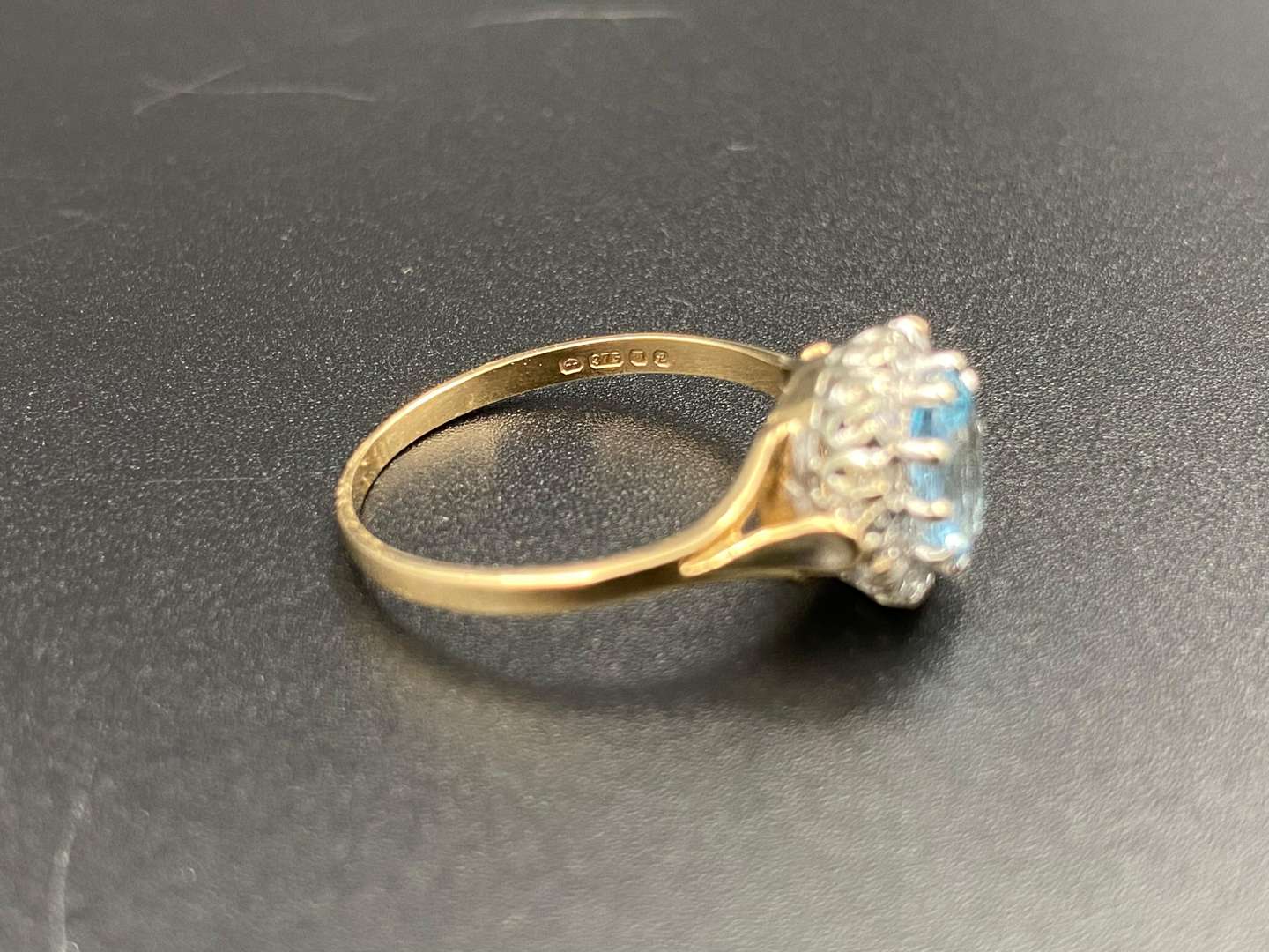 <p>An Aquamarine & Diamond halo ring</p>