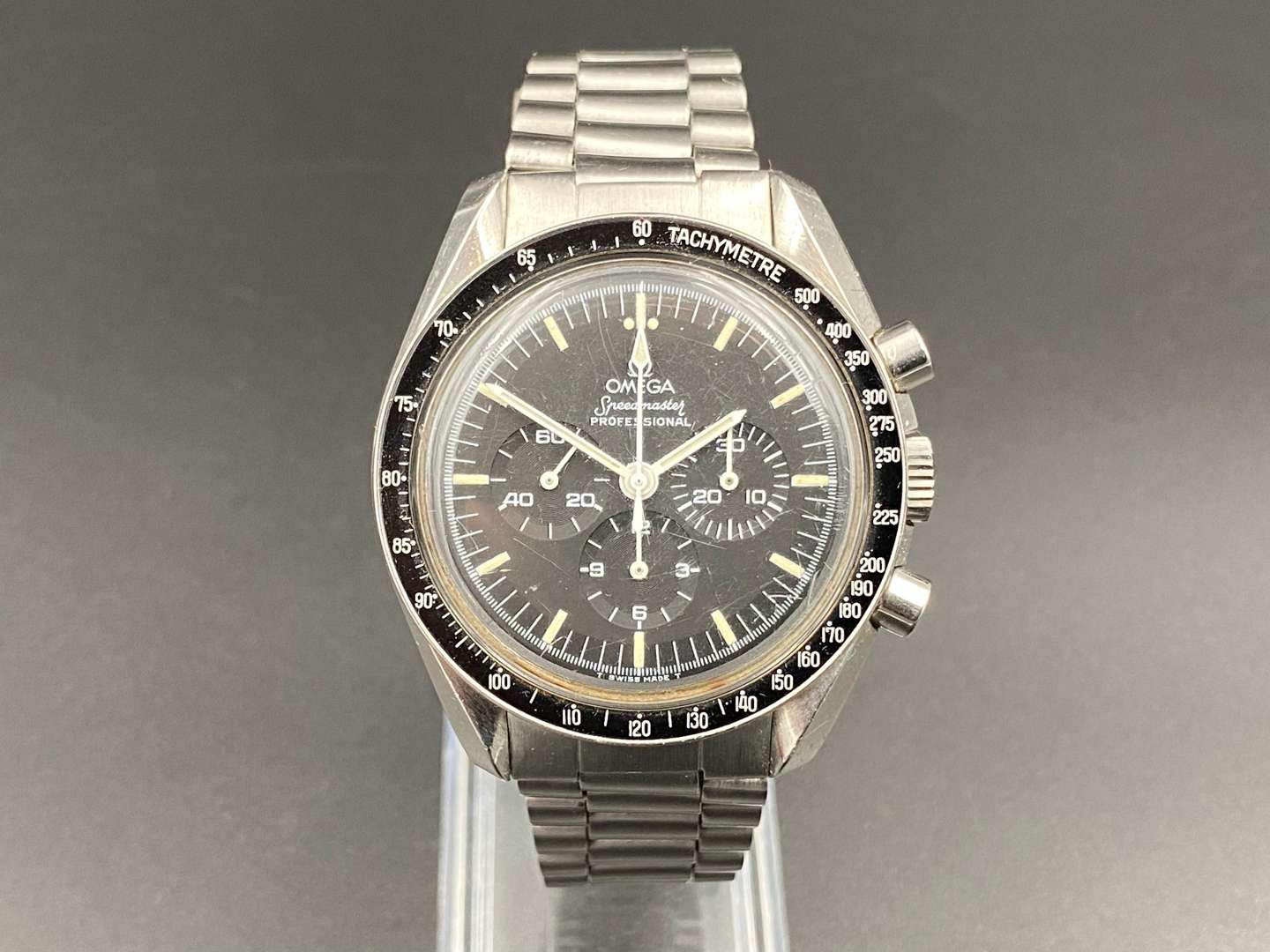 <p>OMEGA. Speedmaster, Moonwatch, stainless steel, two button chronograph, ST145.022. c 1971.</p>