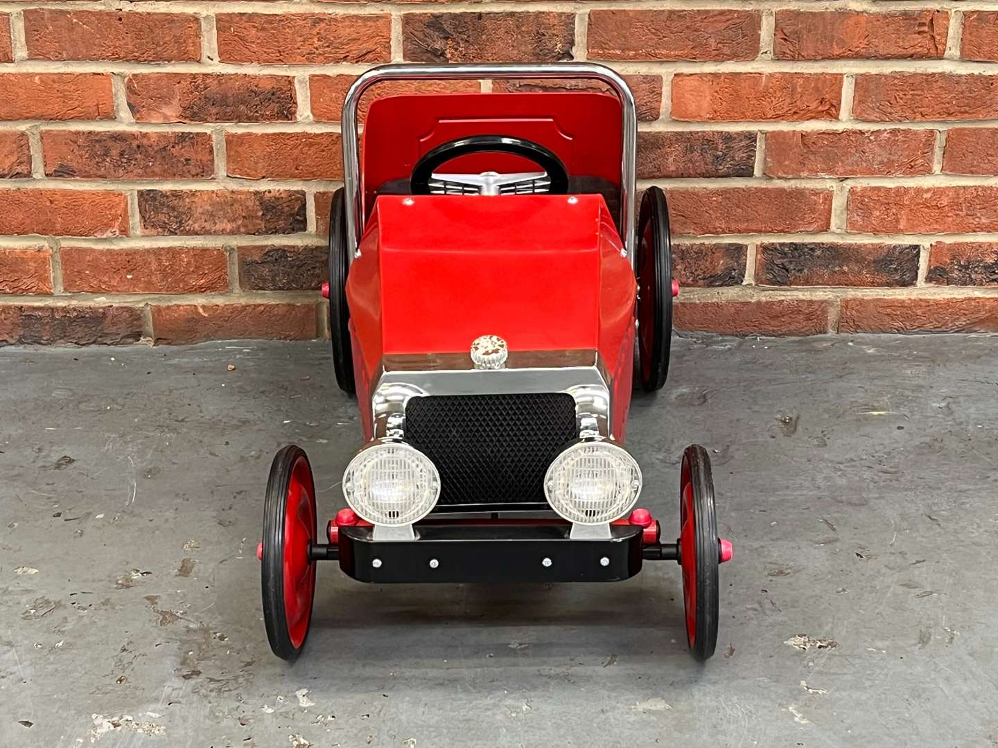 <p>Tin Plate Childs Pedal Car</p>