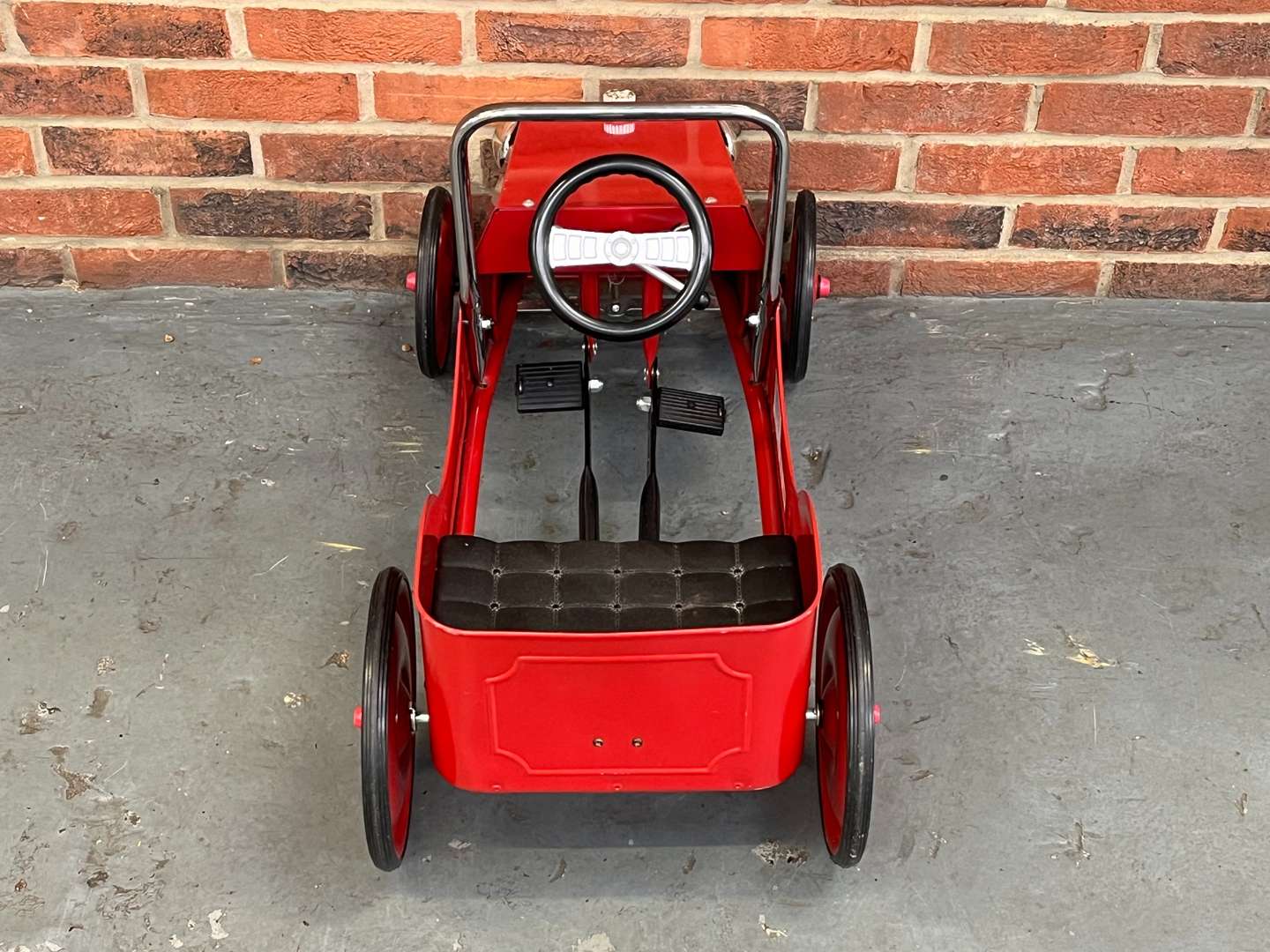 <p>Tin Plate Childs Pedal Car</p>