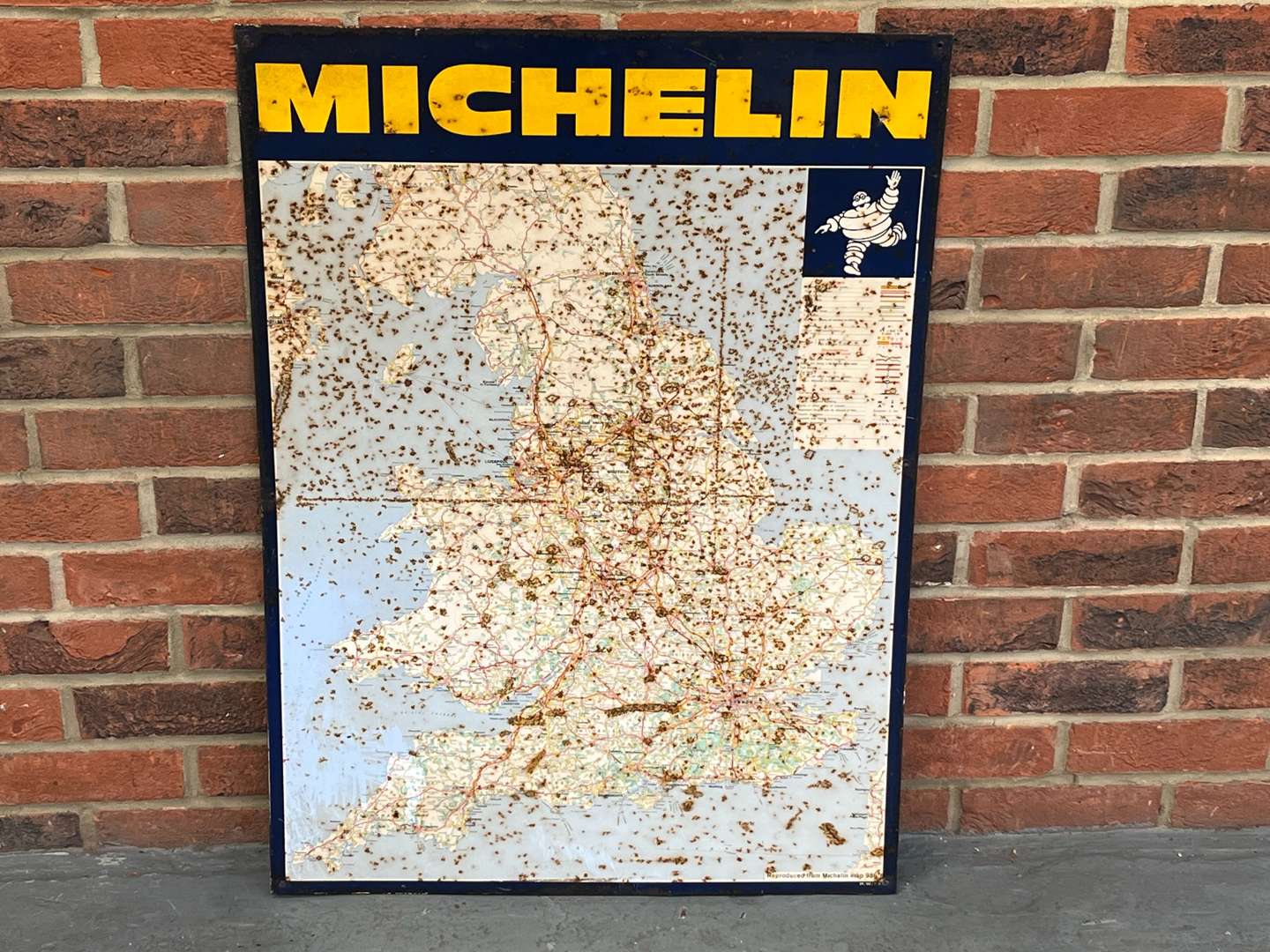 <p>Michelin Tin Map Sign</p>