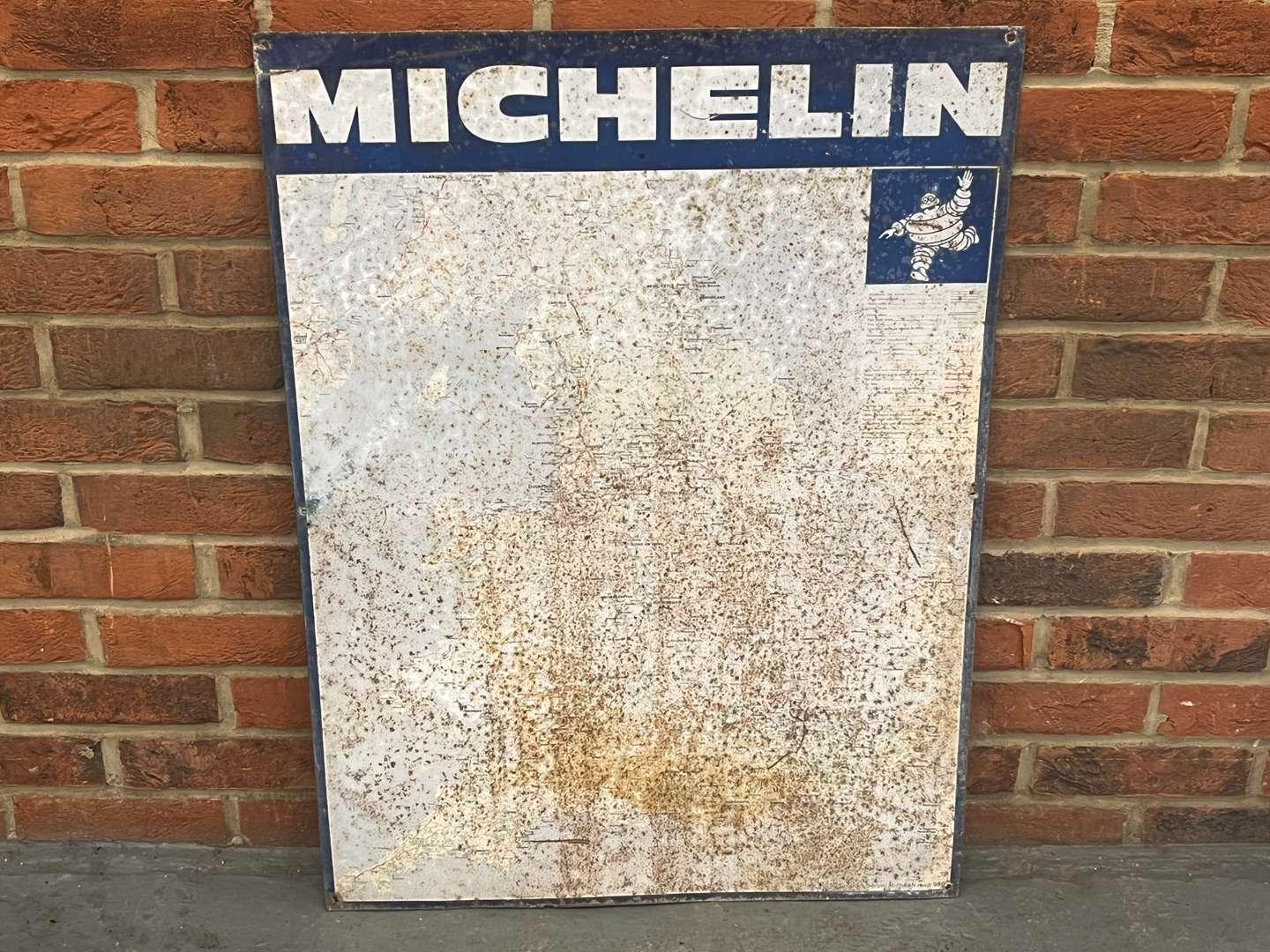 <p>Michelin Tin Map Sign</p>