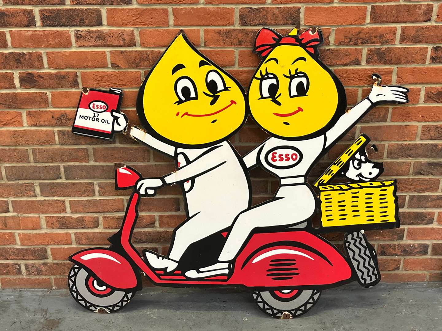 <p>Esso Mr and Mrs Drip On A Scooter Large Enamel Sign</p>