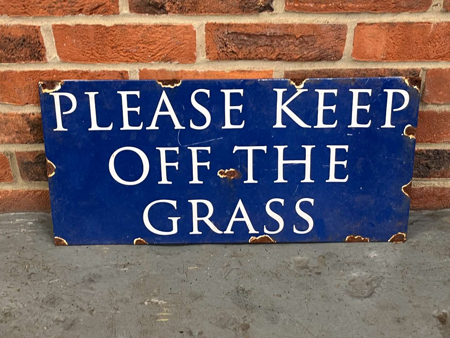 <p>Please Keep Off The Grass Enamel Sign</p>