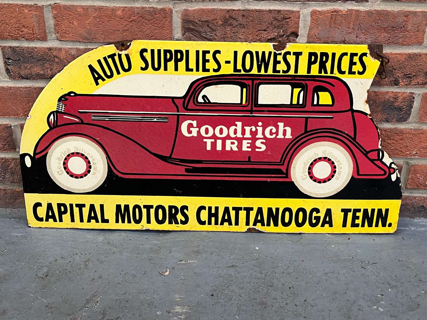 <p>Goodyear Tyre's "Auto Supplies-Lowest Prices Enamel Sign</p>