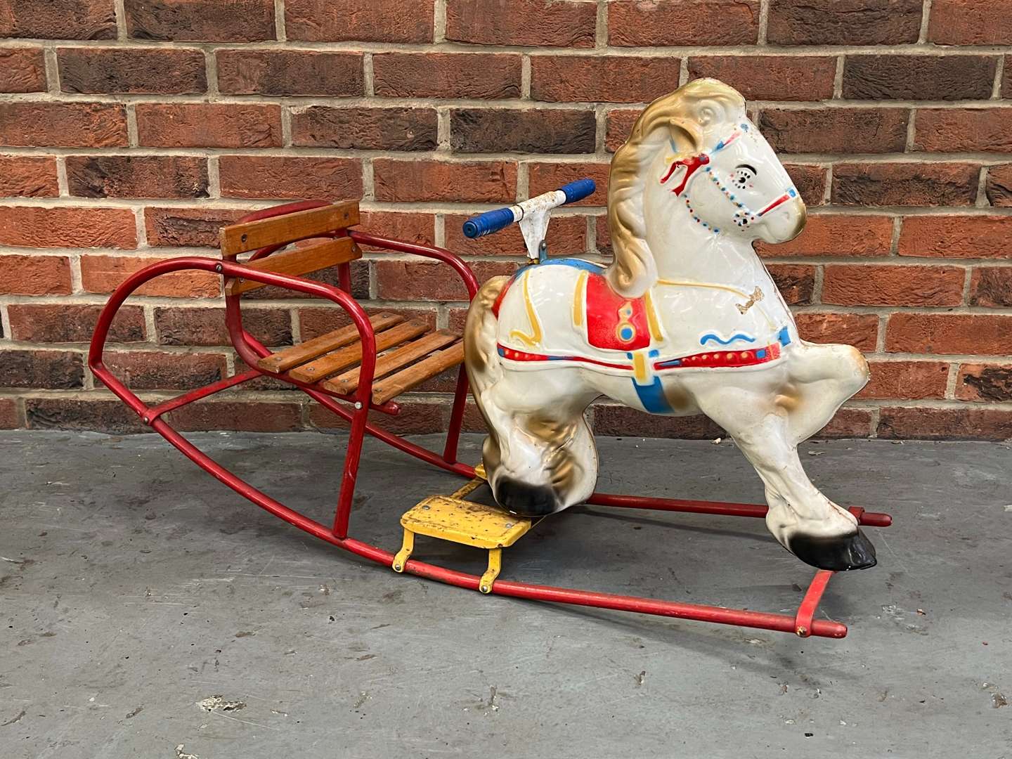 <p>Tri-Ang Tin Plate Childs Rocking Horse</p>