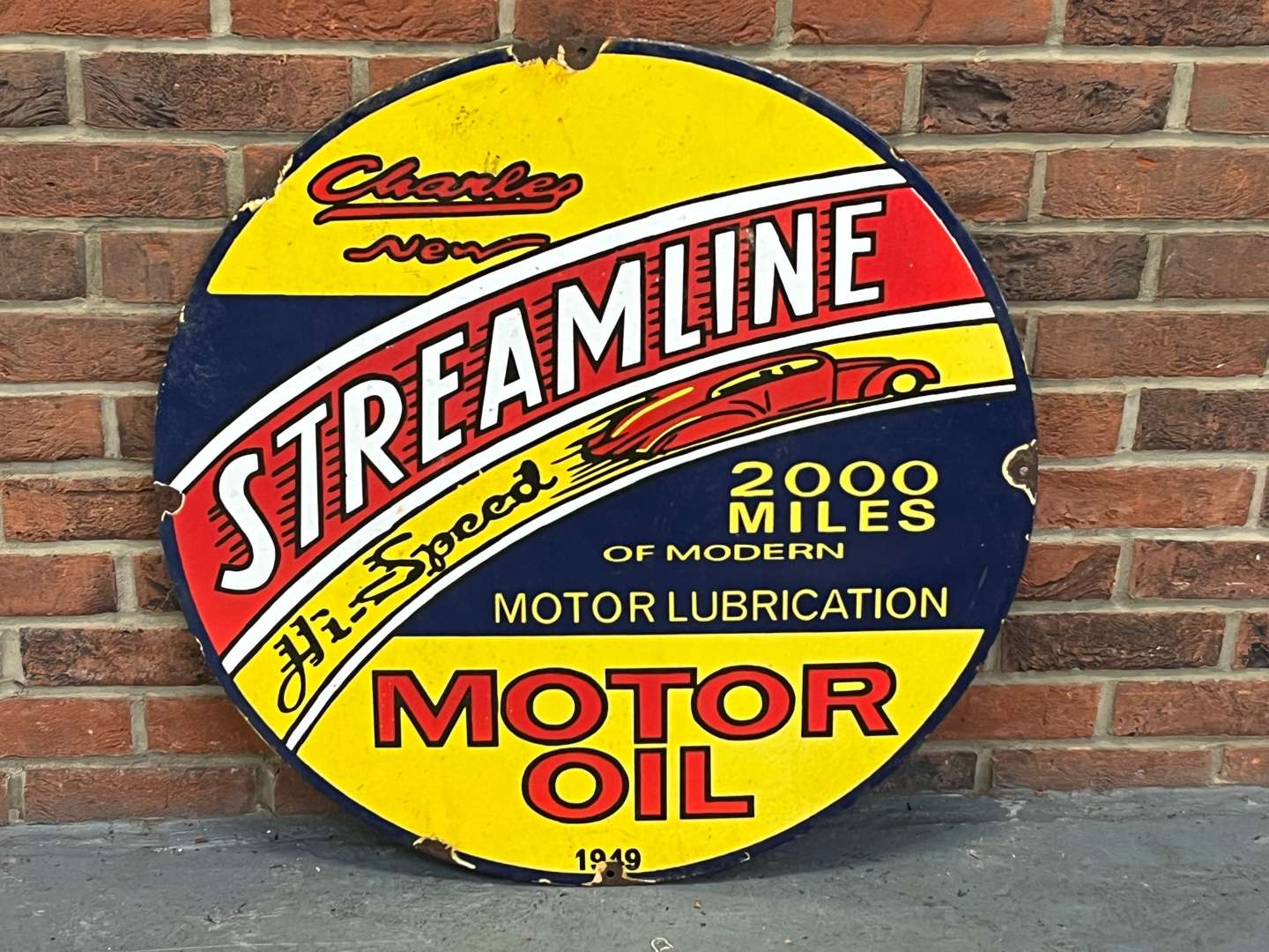 <p>Streamline Motor Oil Circular Enamel Sign</p>