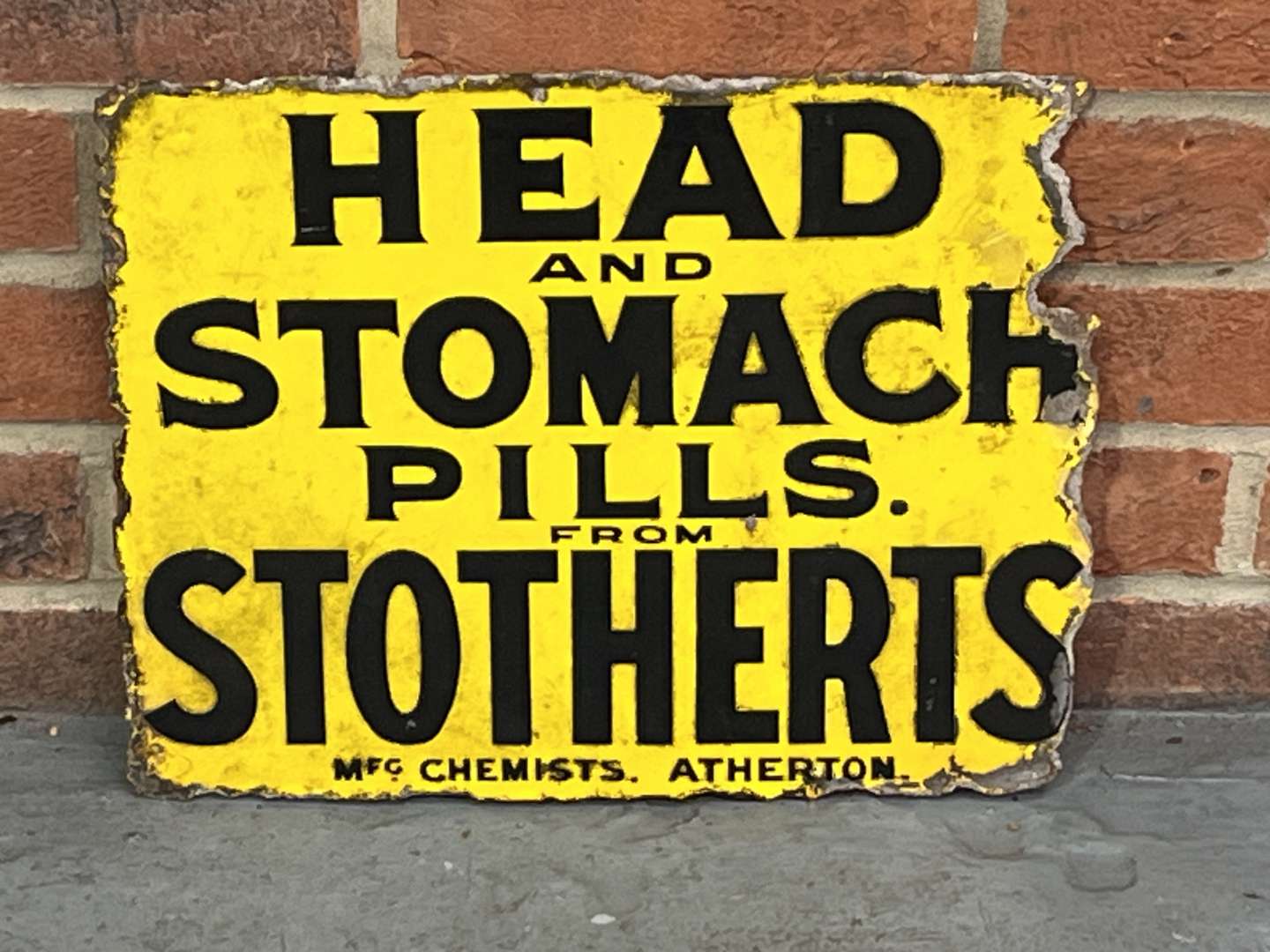 <p>Head & Stomach Pills From Stotherts Sign</p>