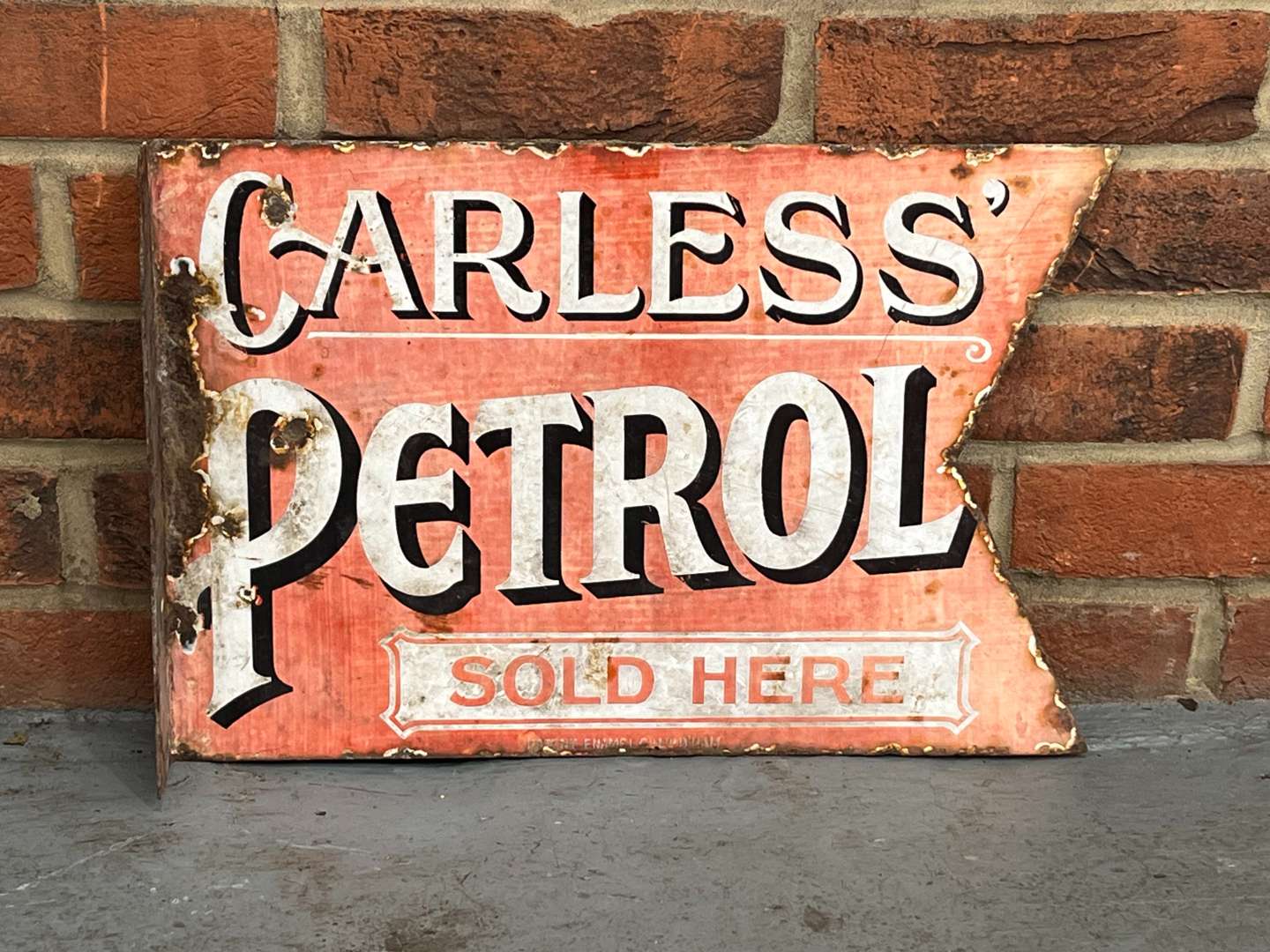 <p>Carless Petrol Sold Here Enamel Flange Sign</p>