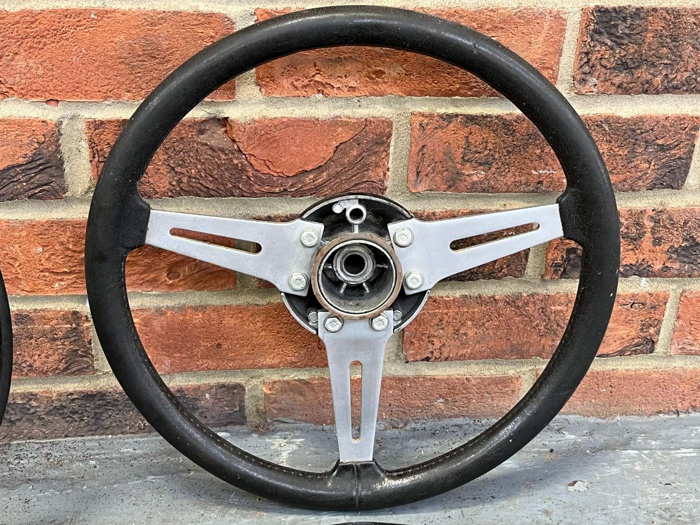 <p>Four Classic Car steering Wheels</p>