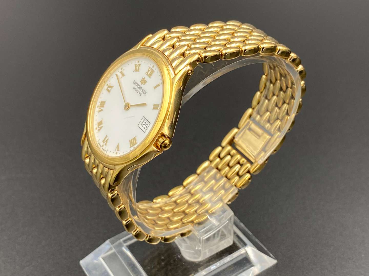 <p>RAYMOND WEIL- Geneve gold plated quartz wristwatch 5568 Z533628</p>