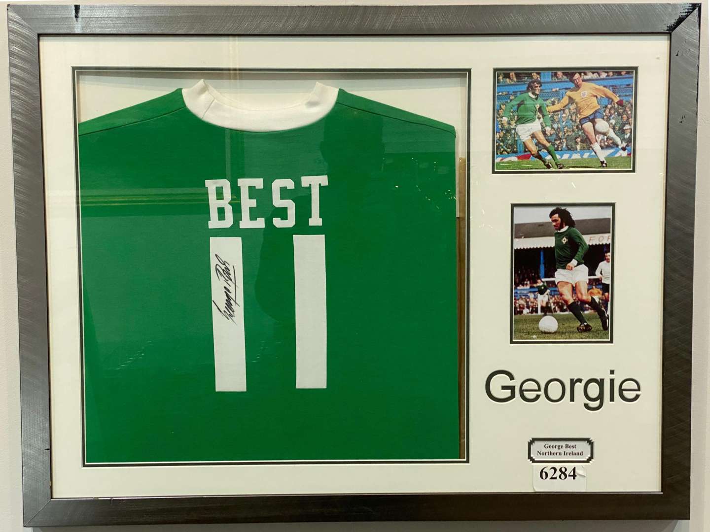 <p>GEORGE BEST, signed and framed Northern Ireland Shirt,</p>