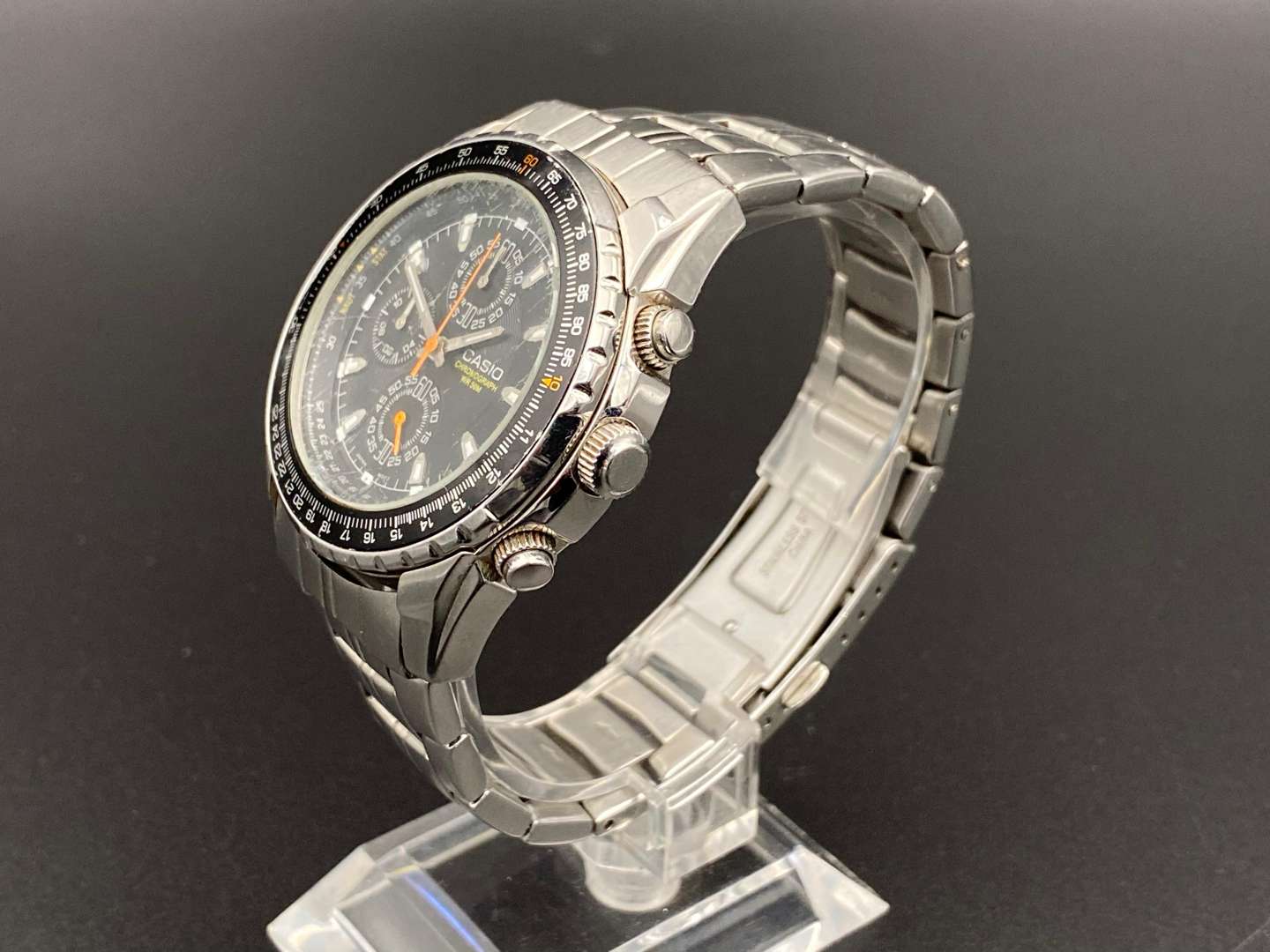 <p>CASIO, a stainless steel quartz chronograph wristwatch,</p>