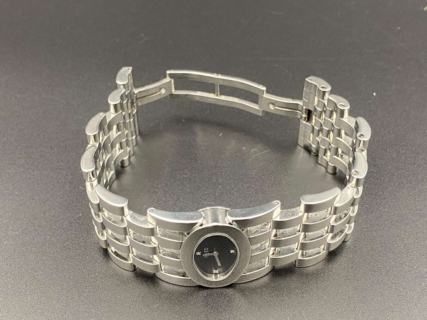 <p>FRED, a &nbsp;stainless steel quartz wristwatch</p>