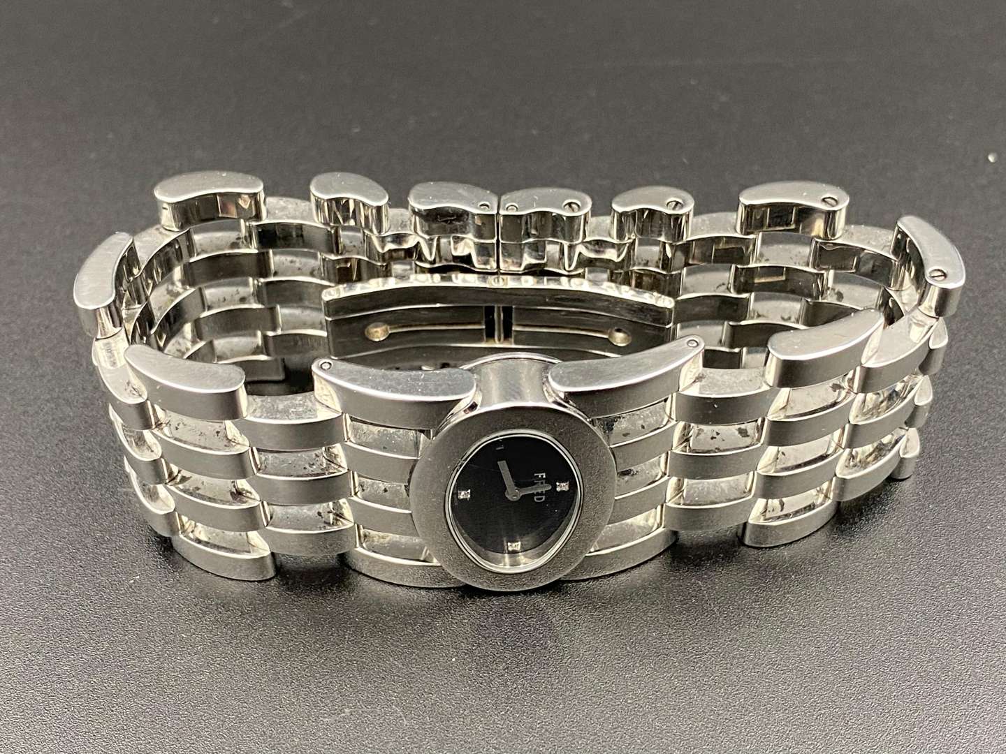 <p>FRED, a &nbsp;stainless steel quartz wristwatch</p>